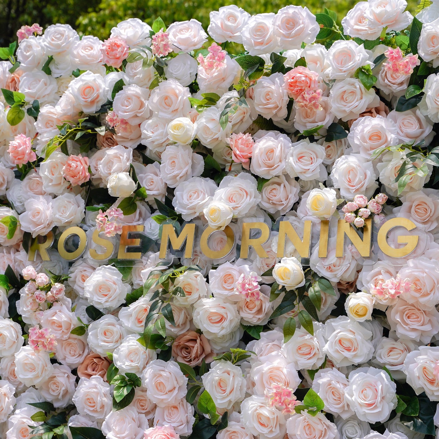 Close-up of peach and white artificial roses