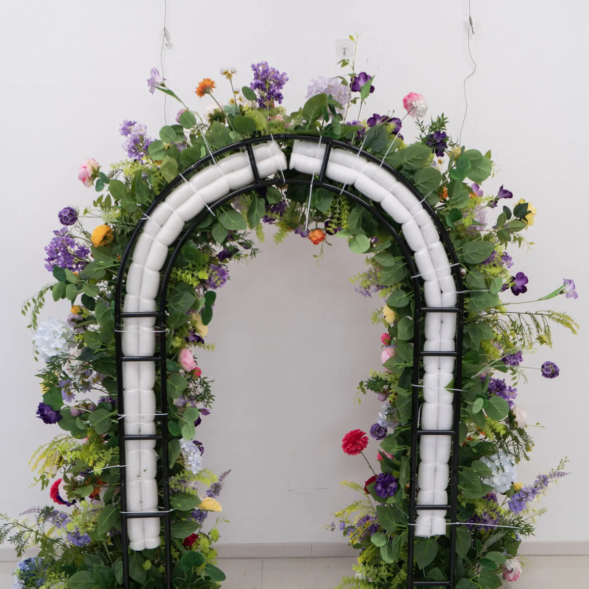 Floral Horn Wedding Arch – Elegant Ceremony Backdrop