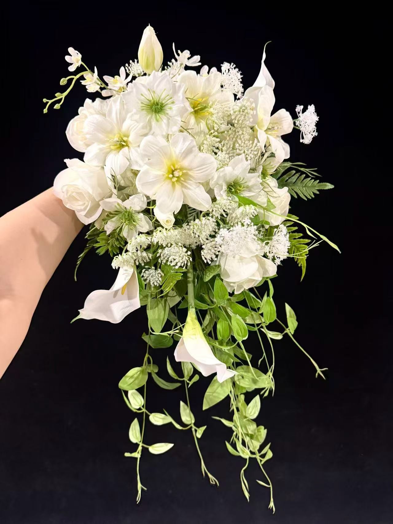 Cascading White Orchid and Greenery Bridal Bouquet by Rosy Flower Wall — luxury bridal bouquet for weddings and events