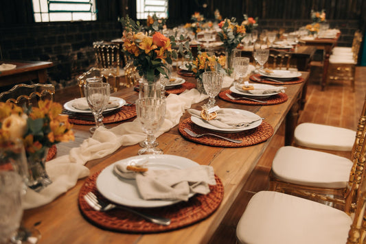 Wedding reception table with flowers and place settings