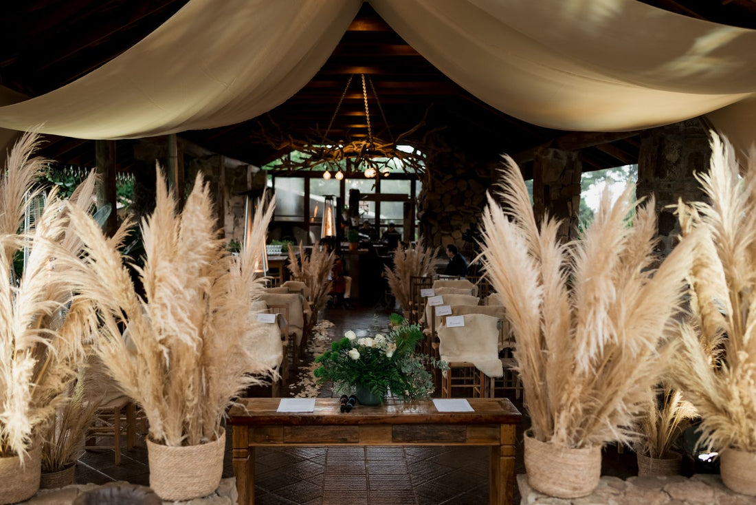 Indoor wedding venue with a floral arrangement and natural decor