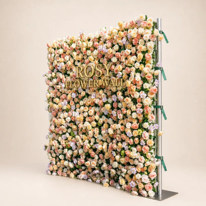 Peach champagne rose silk flower wall right side view in warm white studio with gold ROSY FLOWER WALL logo