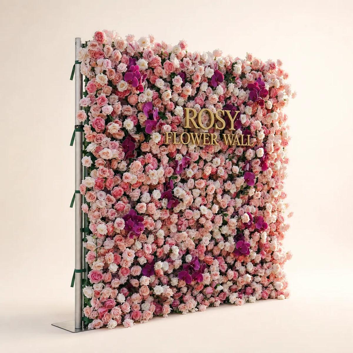 Luxury 4D pink and purple orchid silk flower wall opposite angled view in warm white studio with gold ROSY FLOWER WALL logo