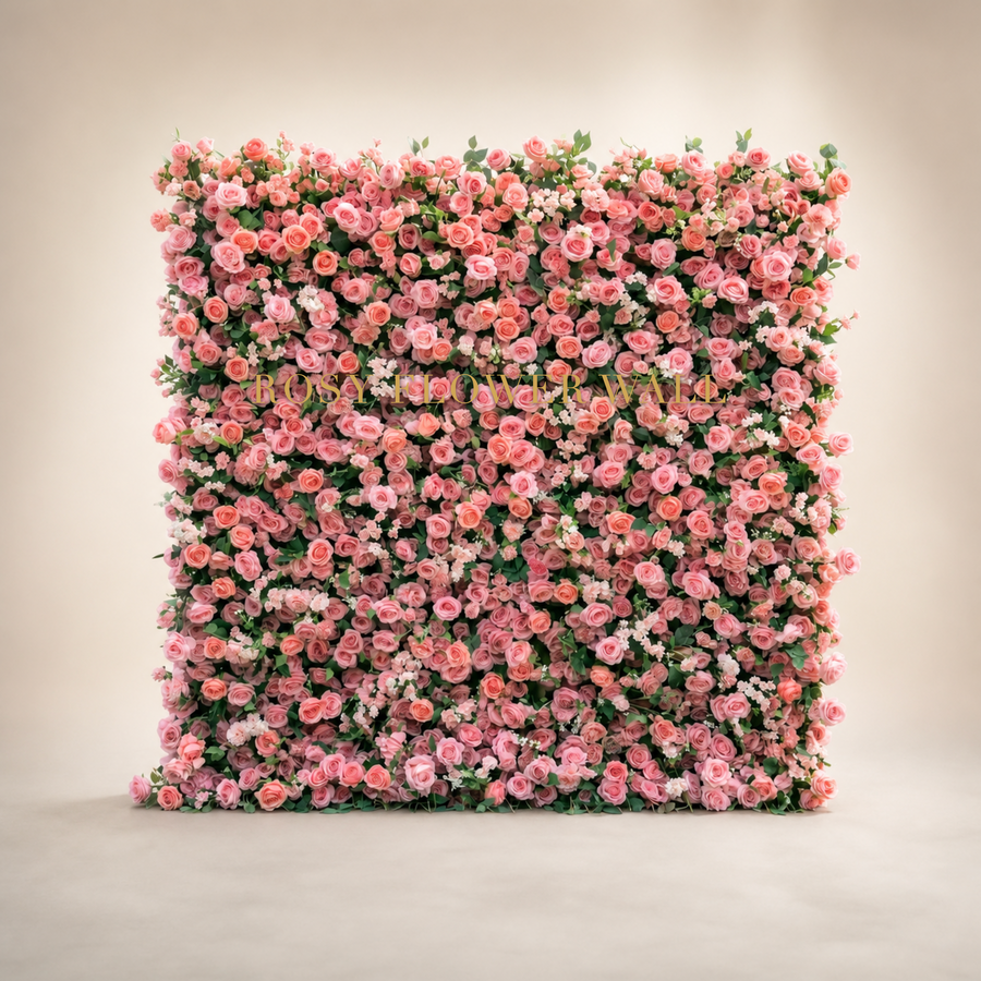 3D light red and coral pink rose flower wall backdrop in warm ivory studio with gold Rosy Flower Wall logo