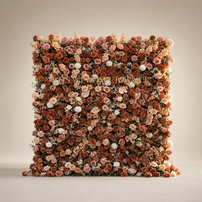 3D terracotta blush and ivory rose flower wall in warm studio with gold Rosy Flower Wall logo