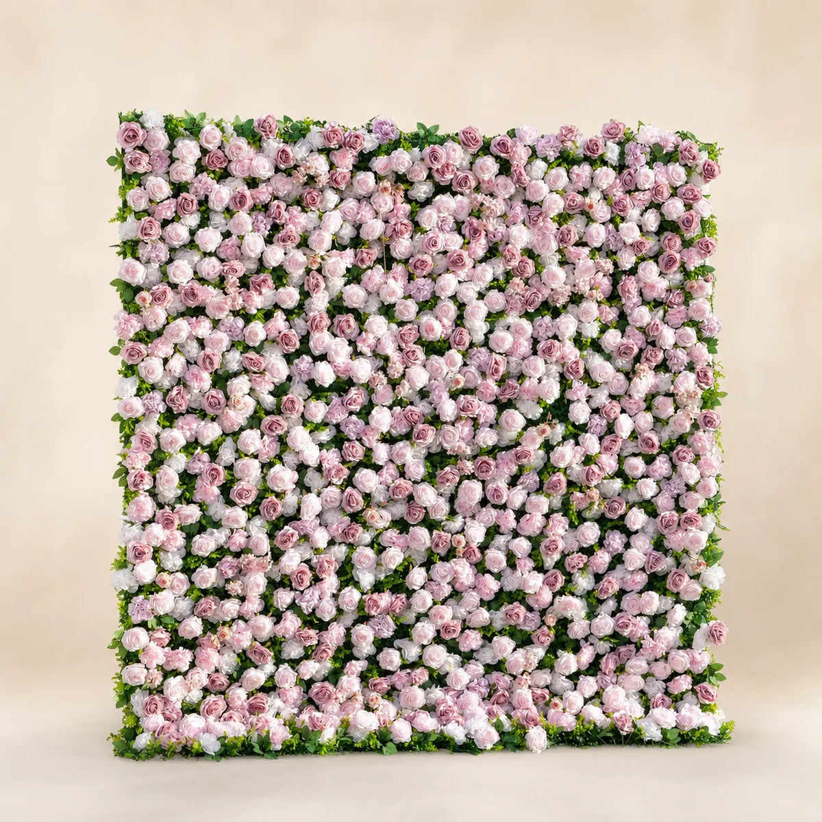 Full view of pink and white 3D zip-up artificial flower wall in warm ivory studio