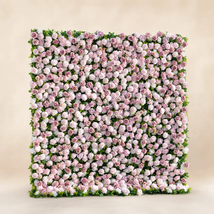 Full view of pink and white 3D zip-up artificial flower wall in warm ivory studio