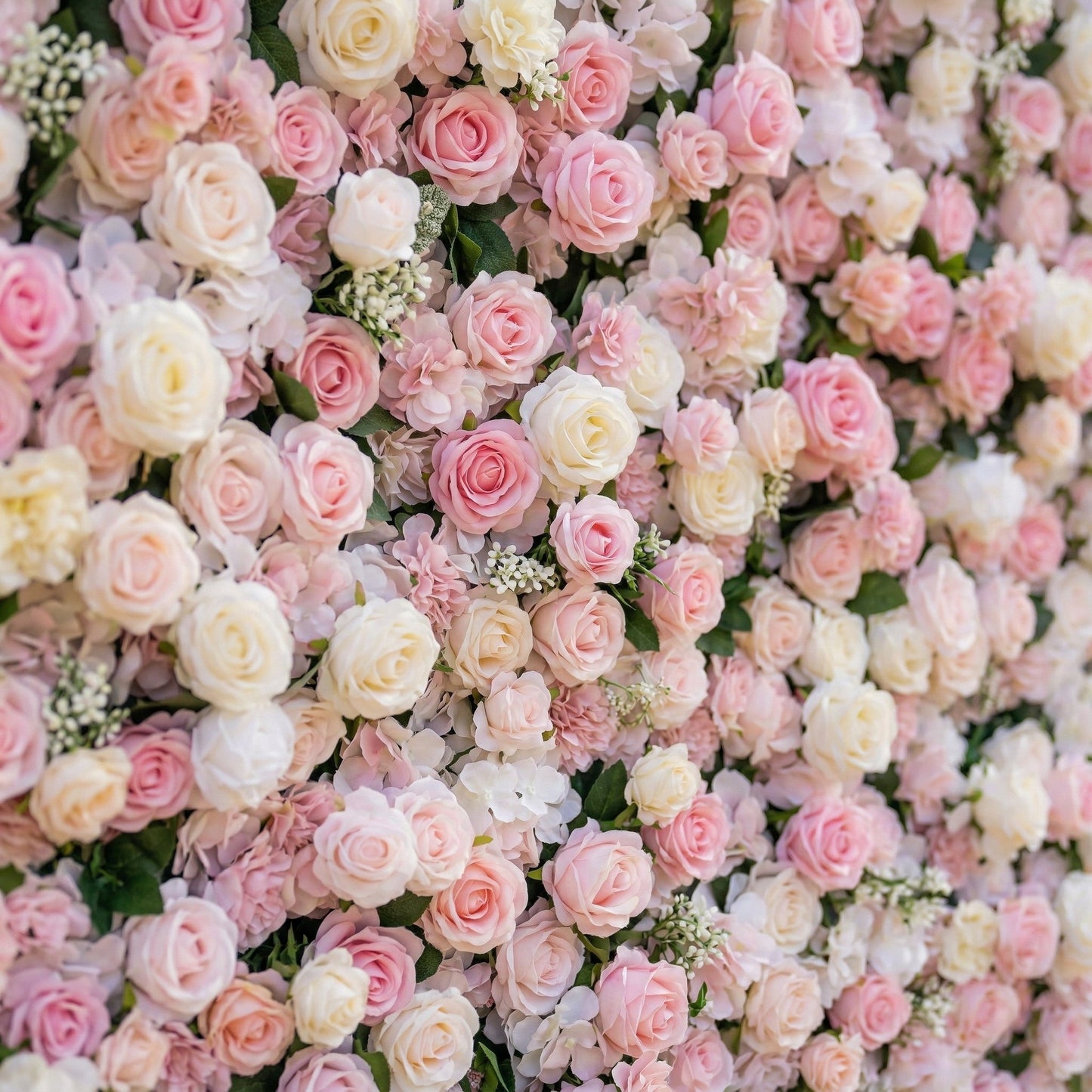 Pink and white silk rose flower wall detail