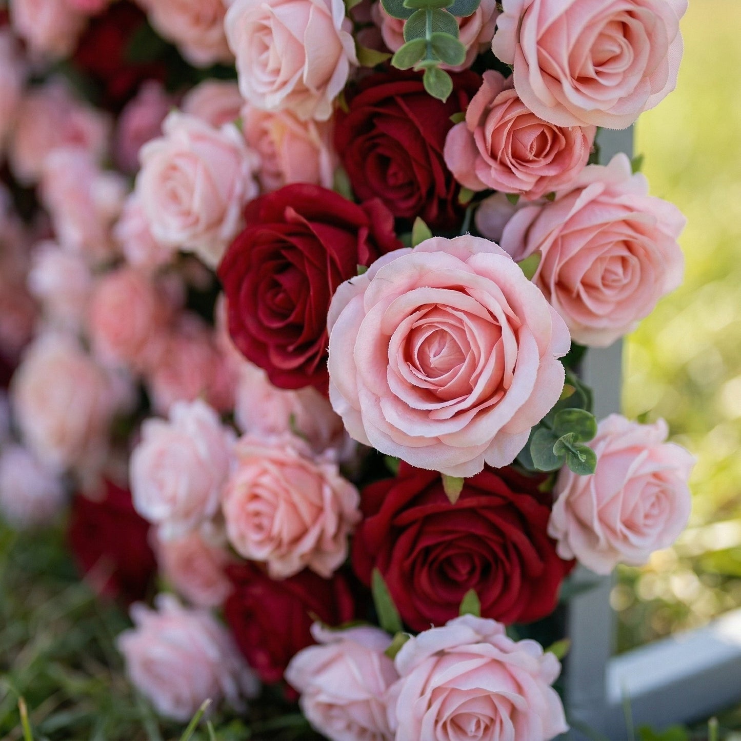 Romantic red pink floral backdrop close-up