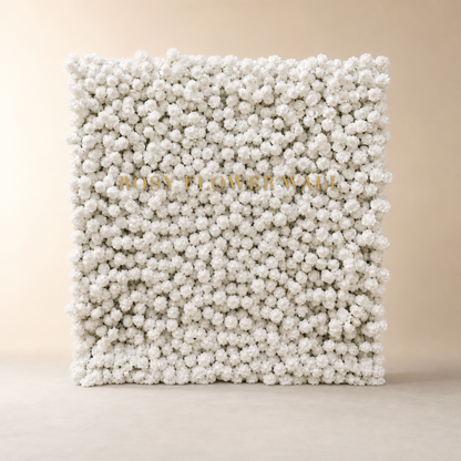 5D white rose flower wall backdrop in warm ivory studio with gold Rosy Flower Wall logo