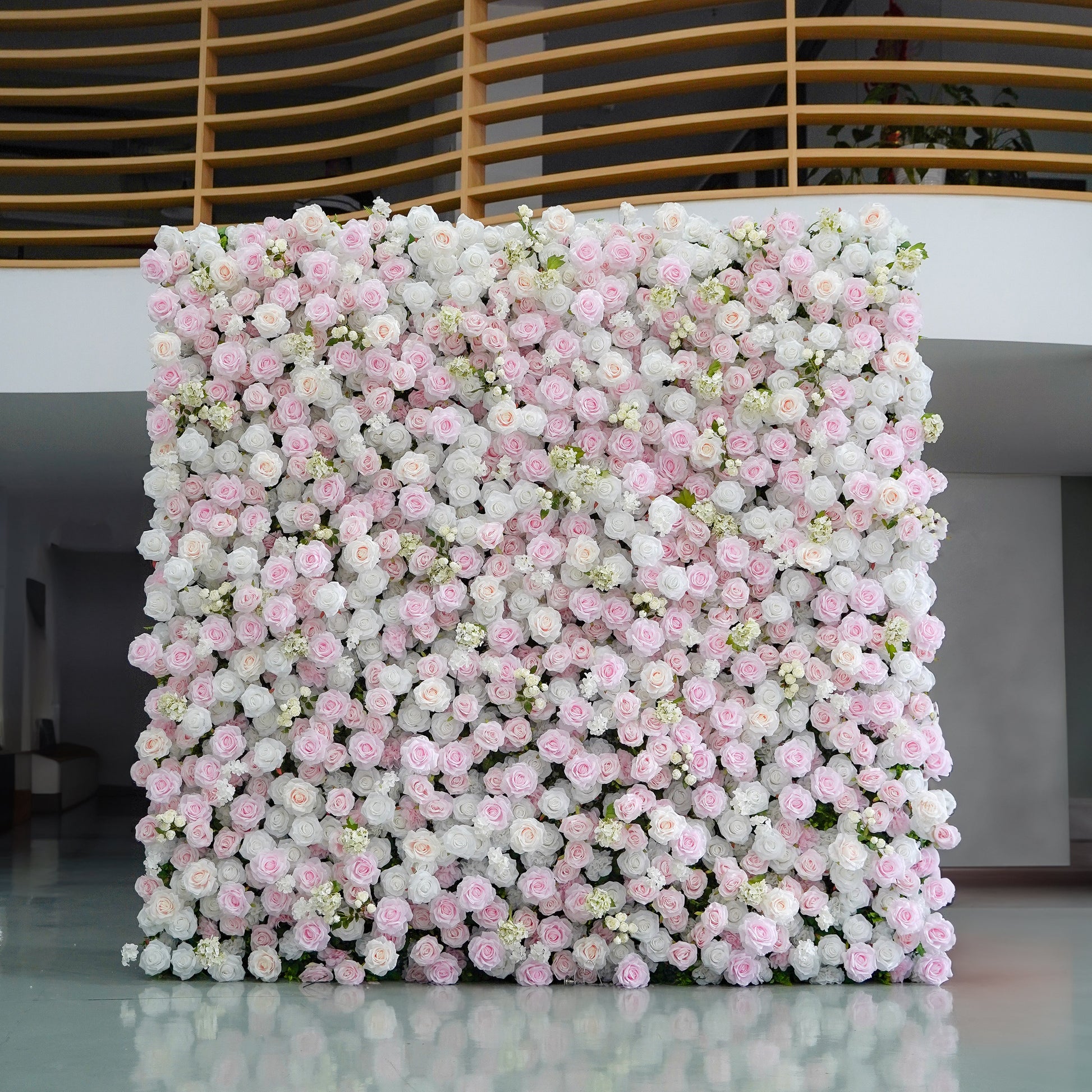 White and blush 5D silk flower wall backdrop, front view in an indoor venue