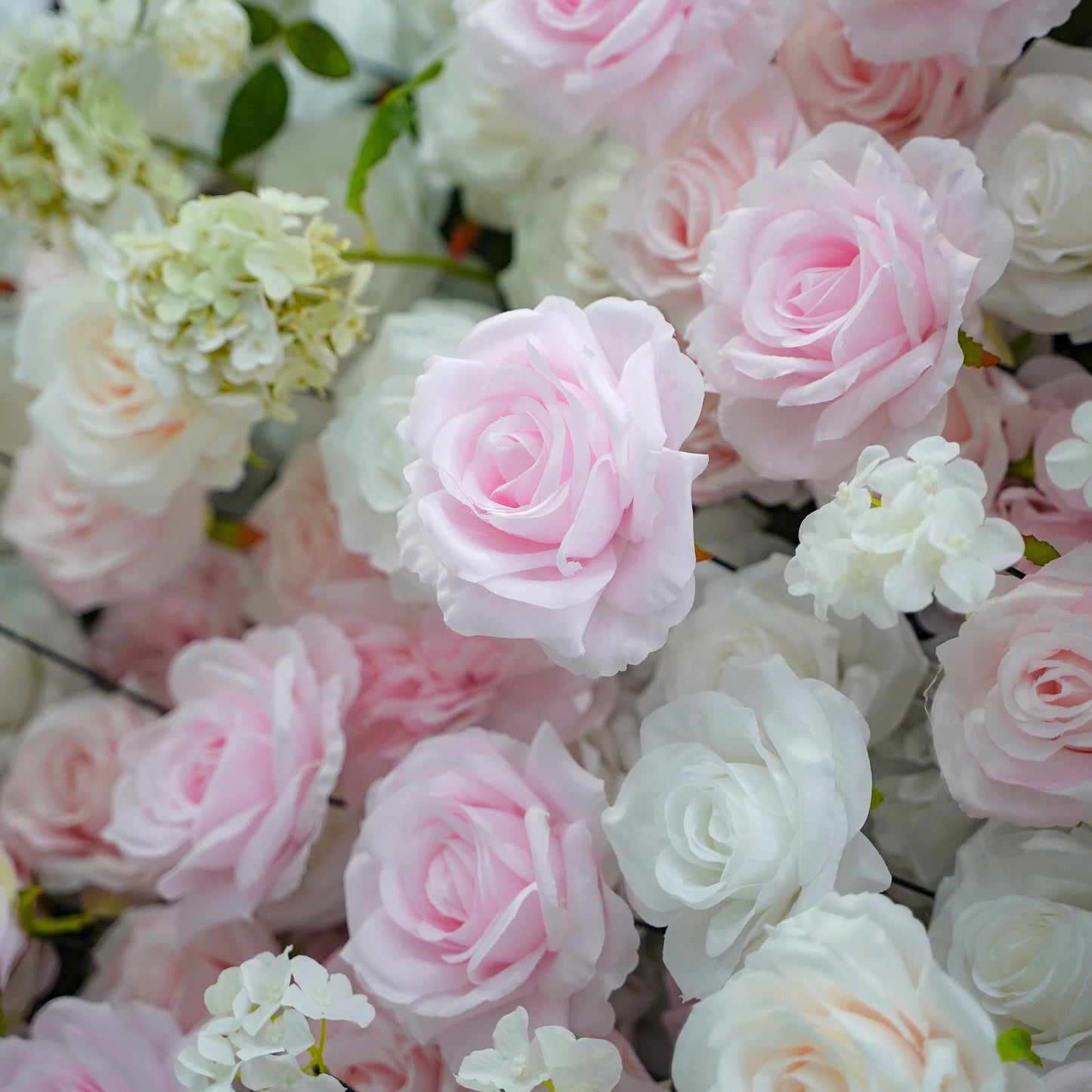 Macro view of layered pink and white silk rose petals