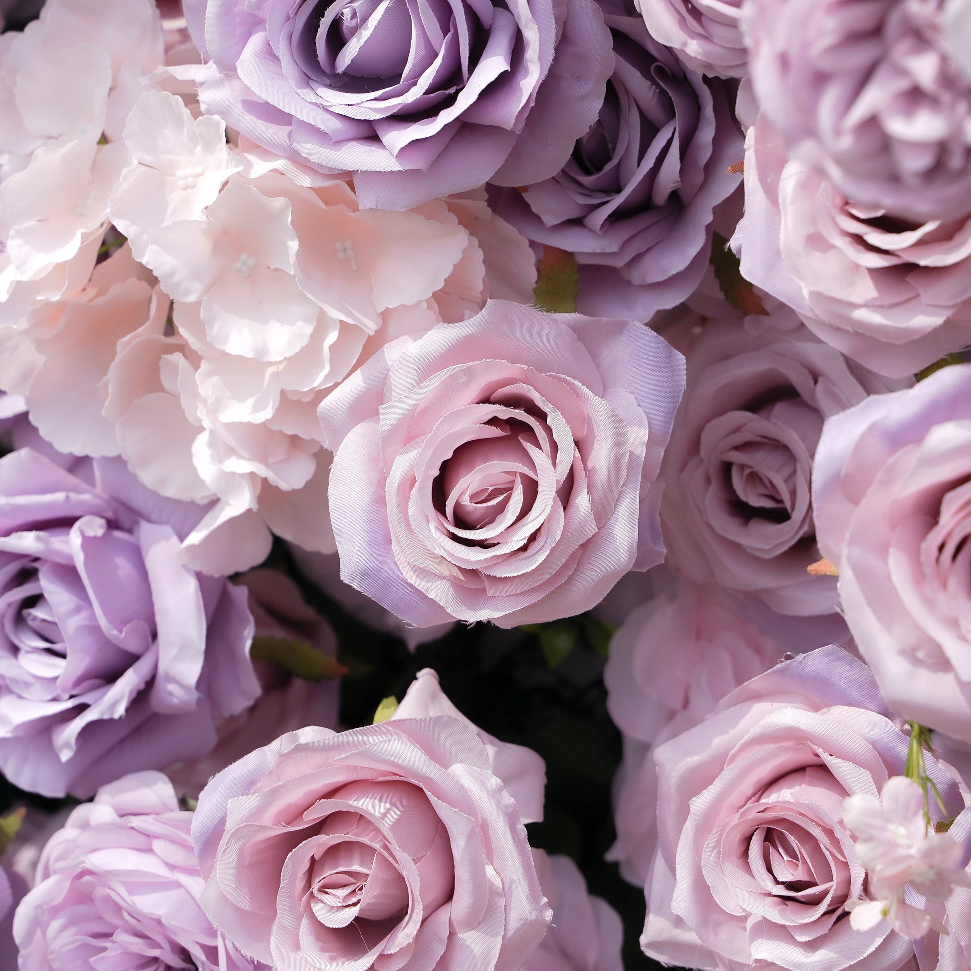 Macro view of pale-pink and lavender silk rose petals