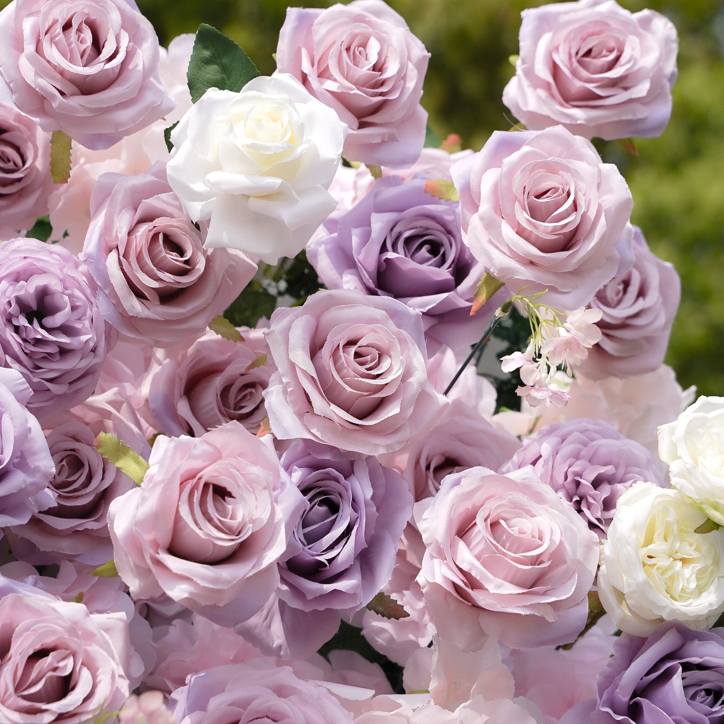 Close-up of white, blush and lavender artificial roses