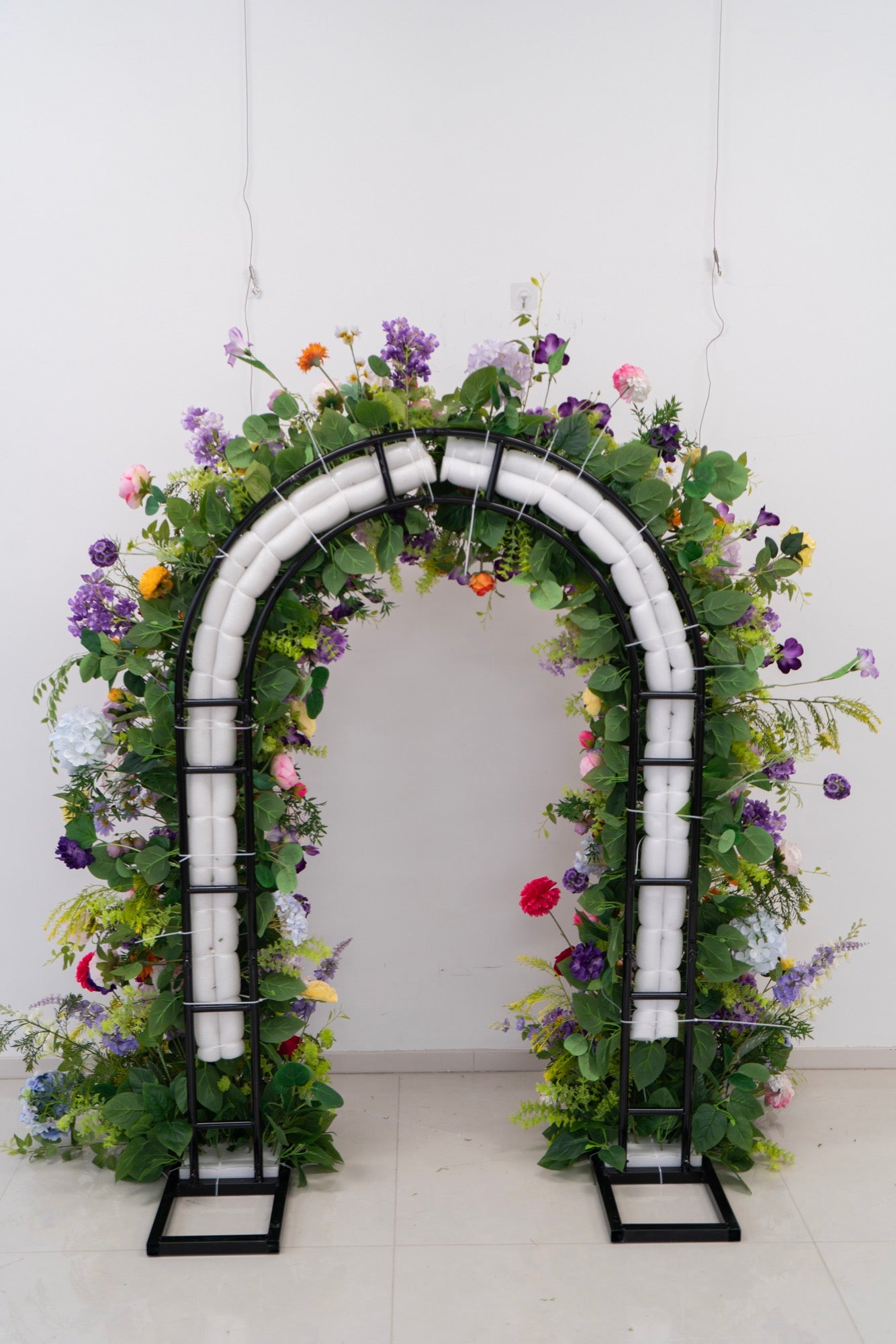 Floral Horn Wedding Arch – Elegant Ceremony Backdrop