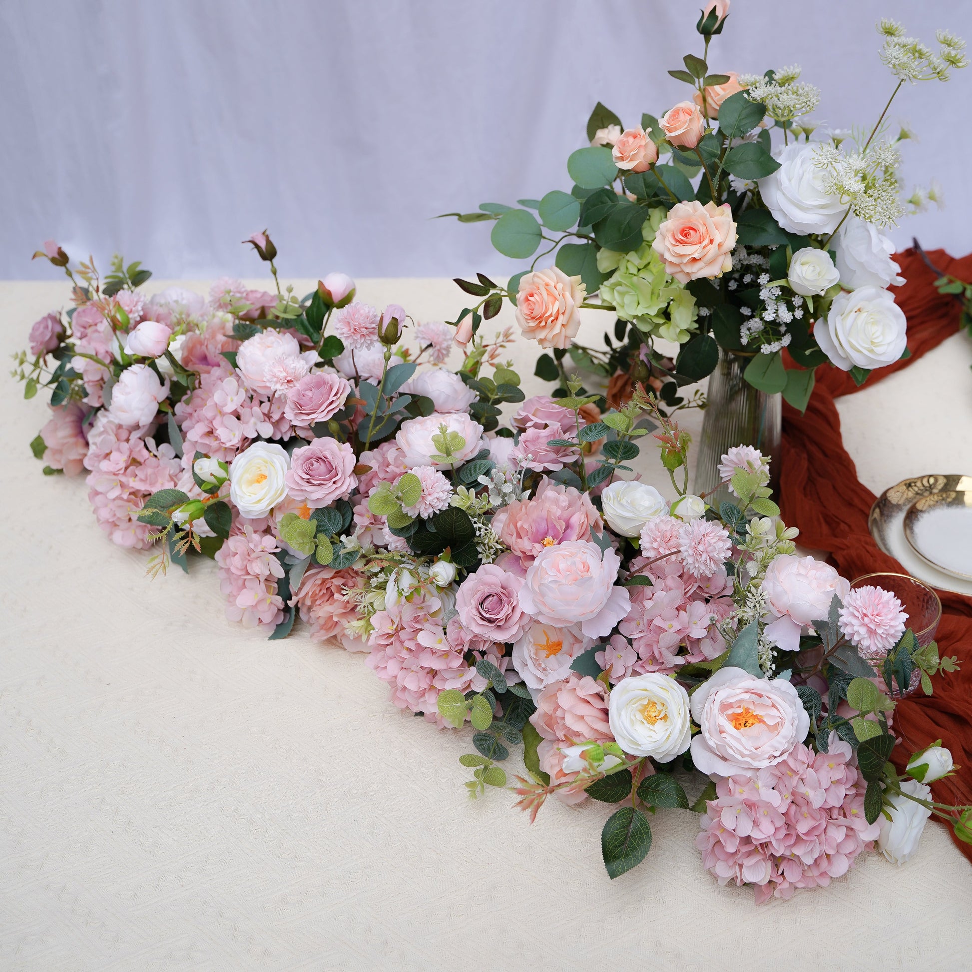 Blush pink silk flower runner for weddings and event tables