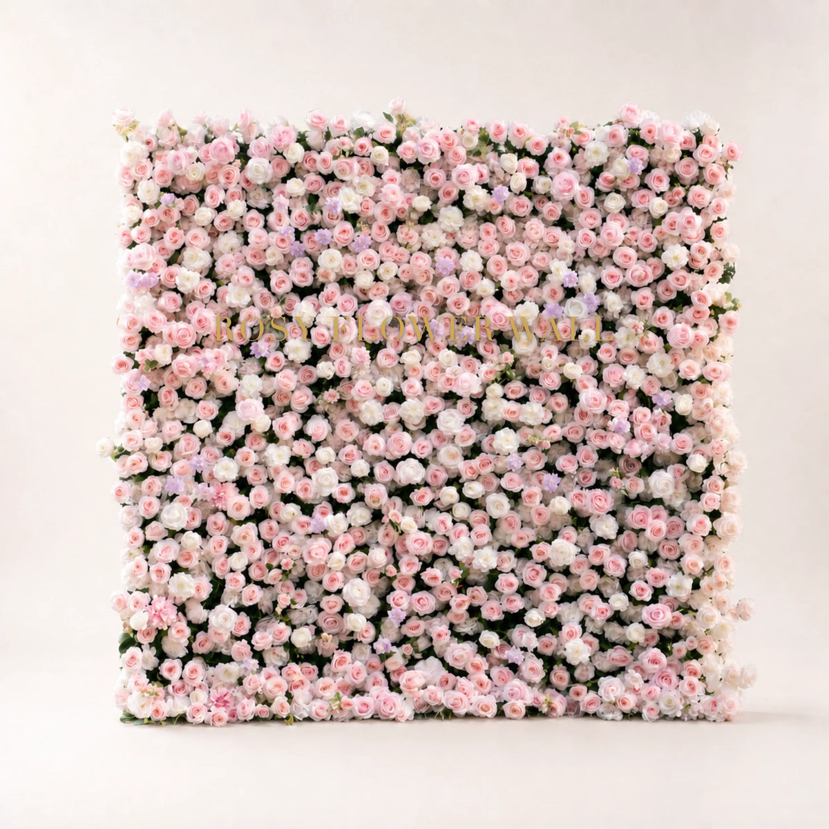 Blush pink and ivory rose 3D flower wall on warm ivory studio background with gold Rosy Flower Wall logo