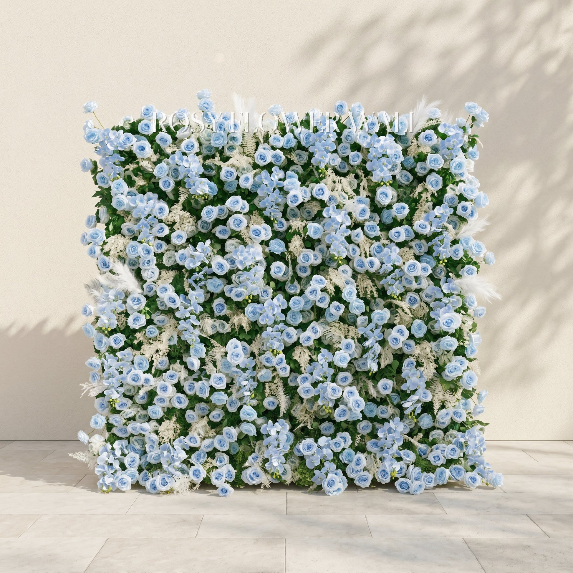 Dusty blue and greenery flower wall with transparent Rosy Flower Wall logo