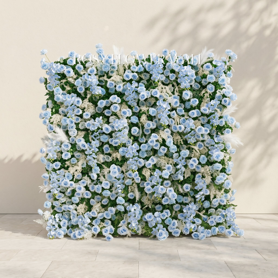 Dusty blue and greenery flower wall with transparent Rosy Flower Wall logo