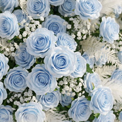 Dusty blue and greenery flower wall close-up