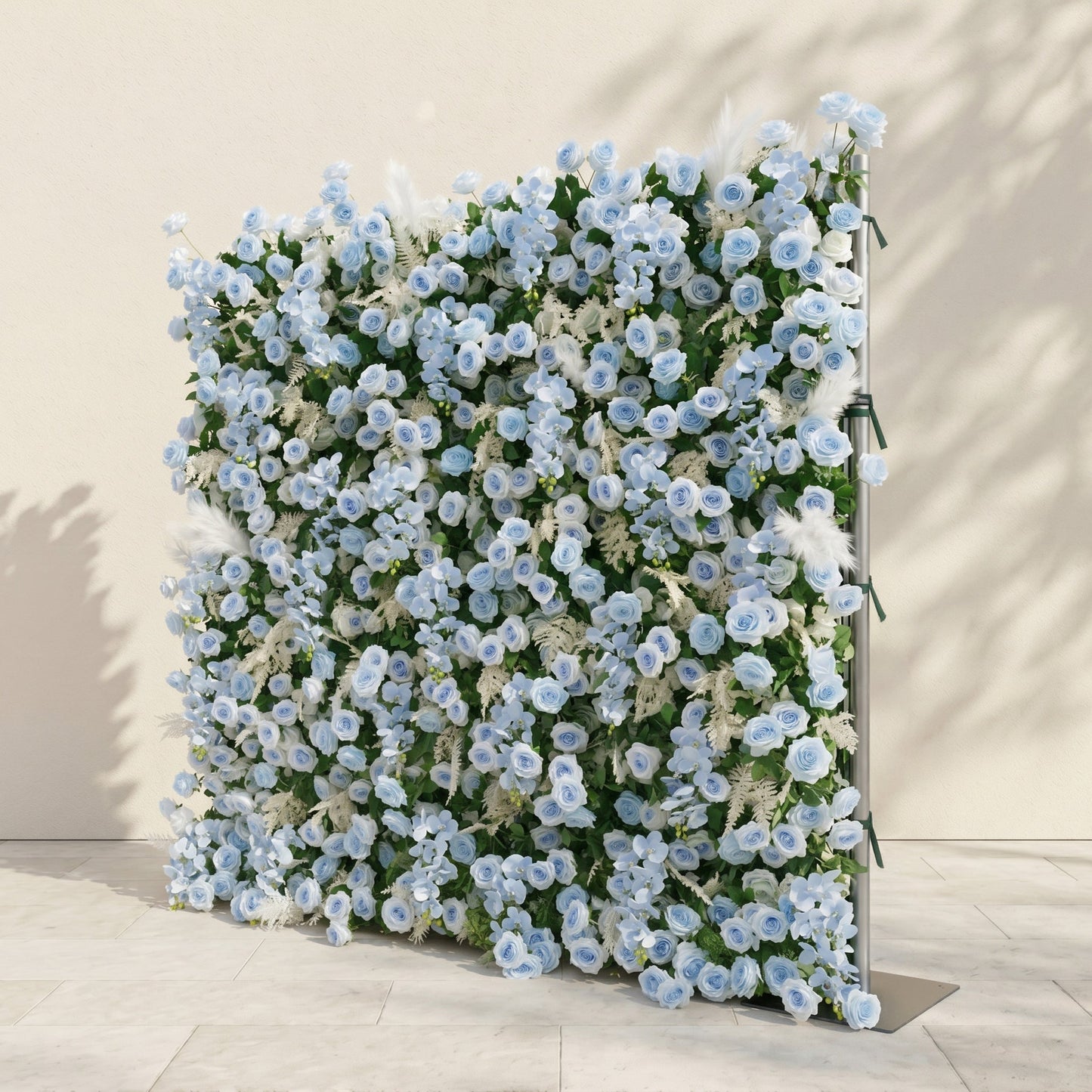 Dusty blue and greenery flower wall side view