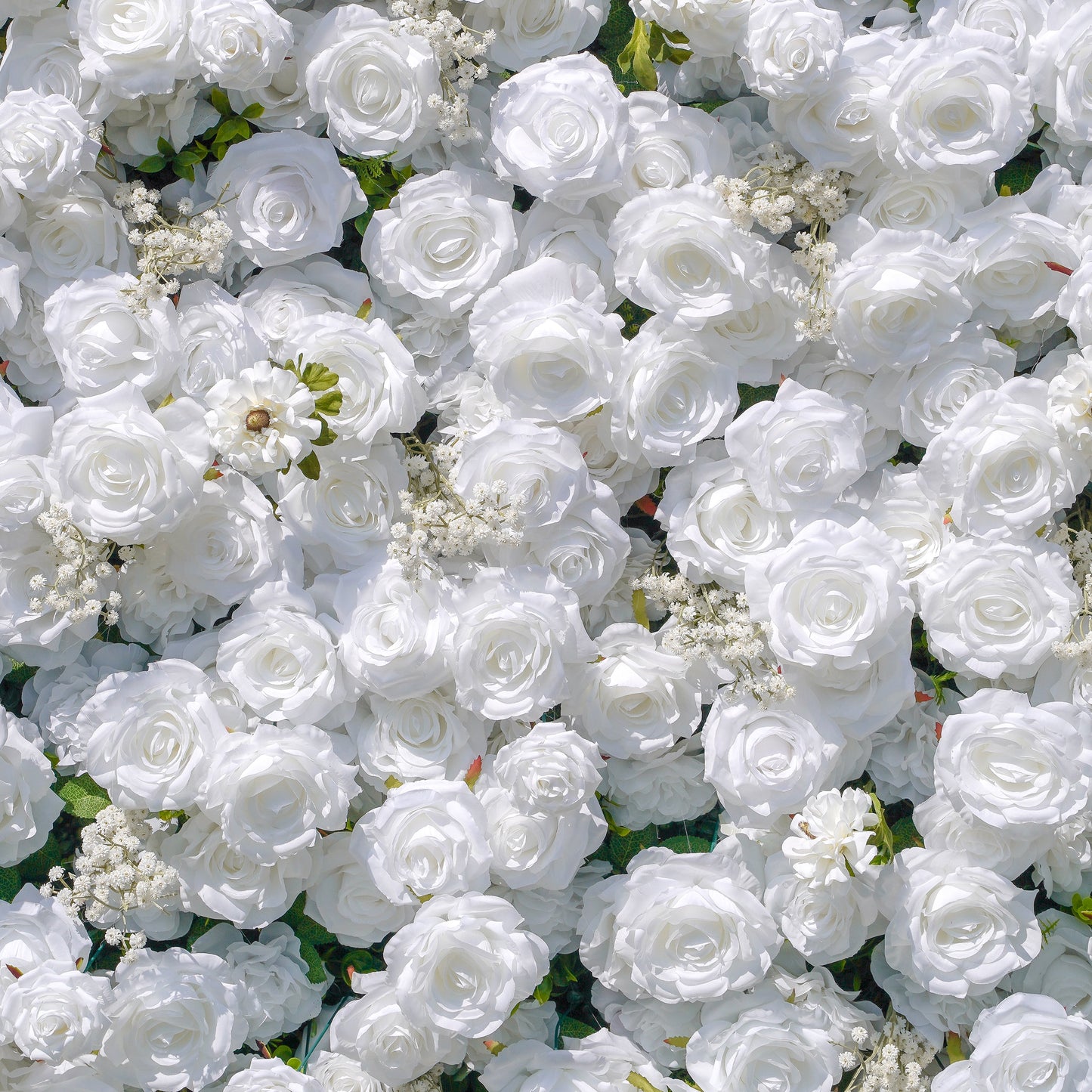 Close-up of white silk flowers on the flower wall