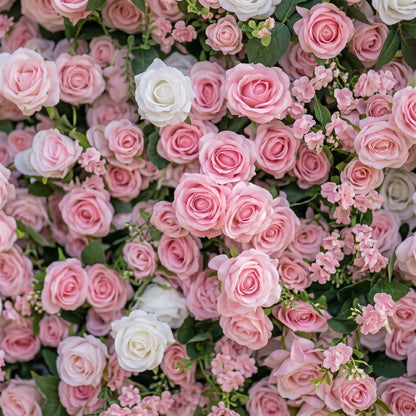 Pink silk rose flower wall close-up