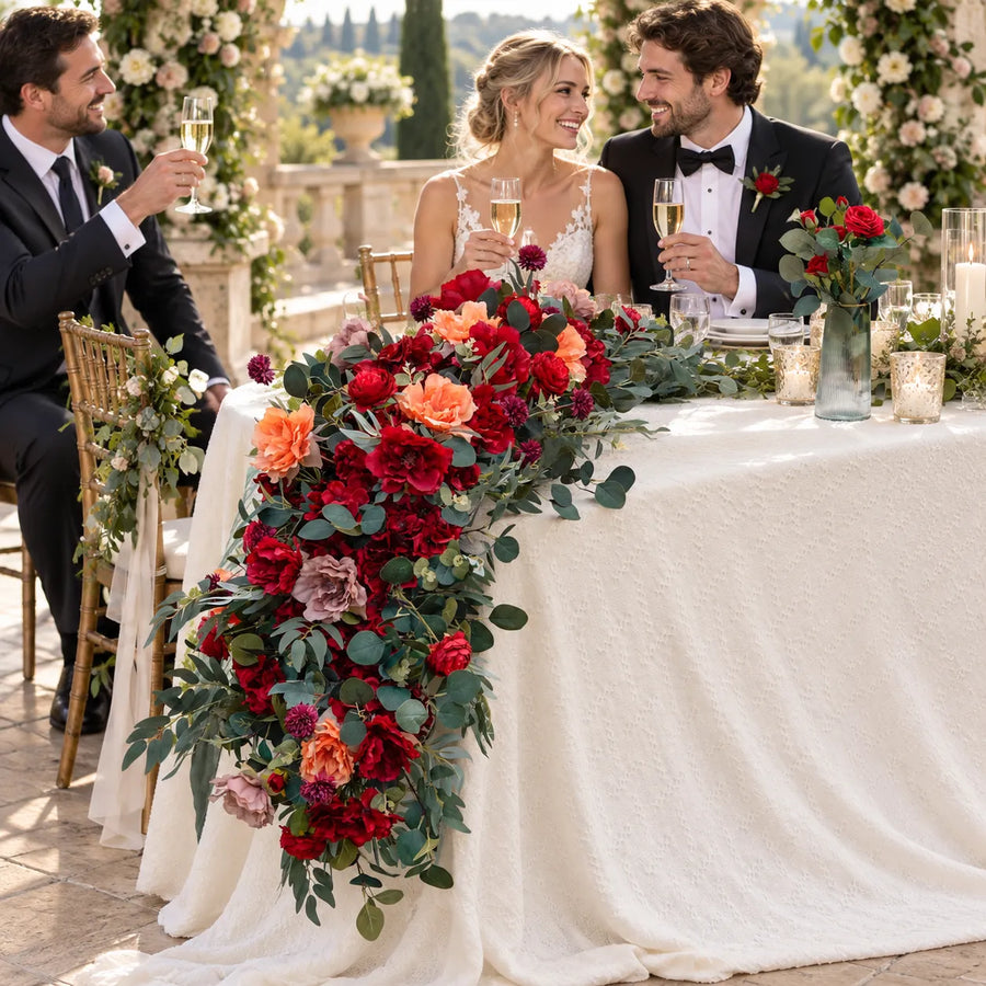 Red, Burgundy & Coral Artificial Flower Runner styled for a wedding celebration