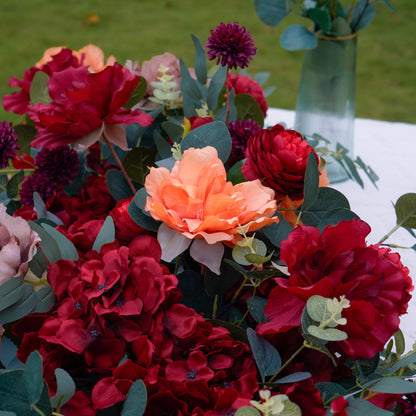 Burgundy and coral silk flower runner detail
