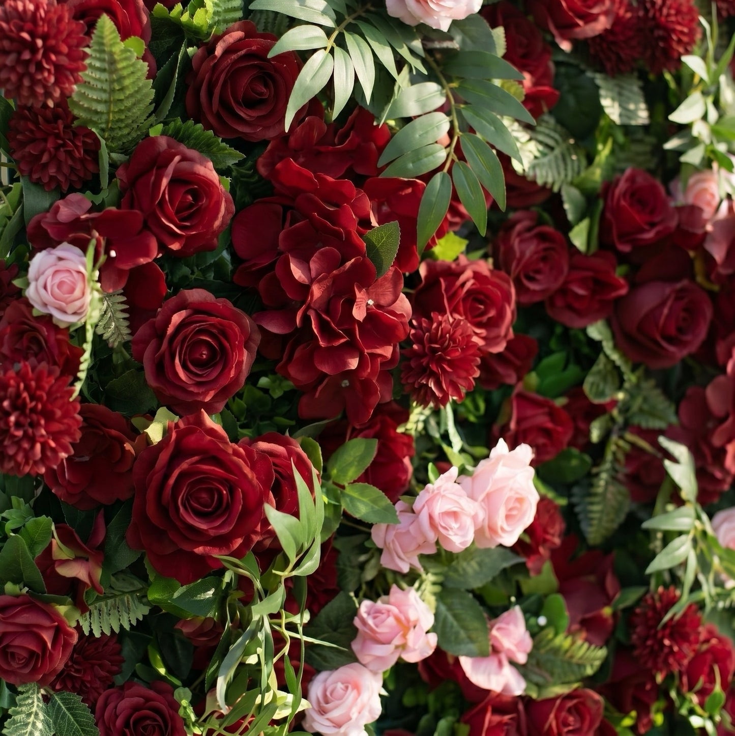 Red hydrangea rose and greenery backdrop detail