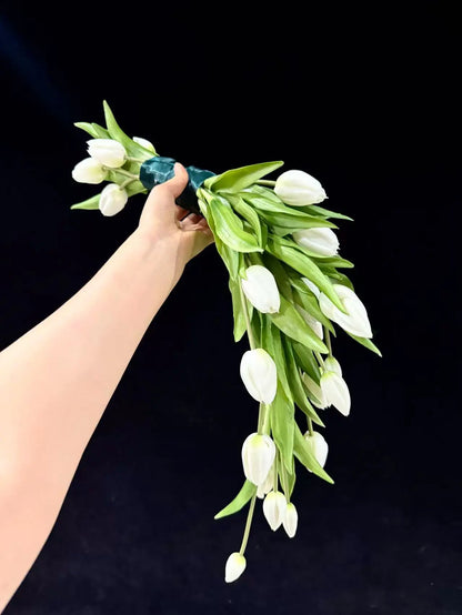 Cascading White Tulip Bridal Bouquet by Rosy Flower Wall — luxury bridal bouquet for weddings and events