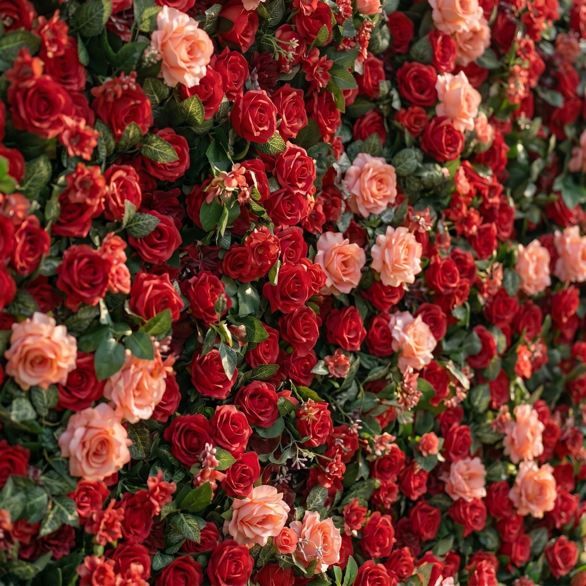 Close-up detail of deep red and coral artificial roses