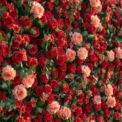 Close-up detail of deep red and coral artificial roses