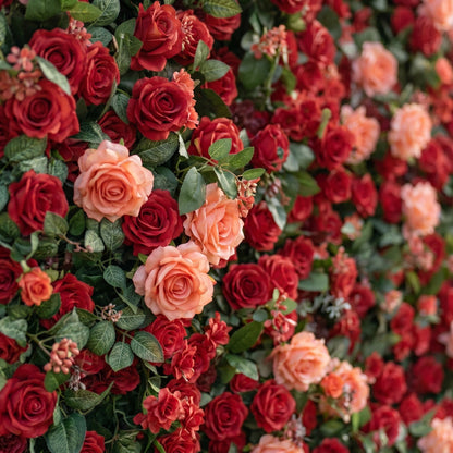 Dimensional detail of red coral roses and patterned foliage
