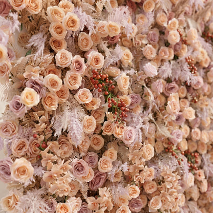 Angled close-up of silk roses and textured foliage on the Rove flower wall