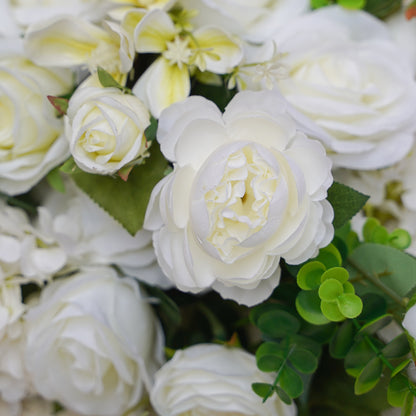 Close-up of white rose and greenery artificial flower runner