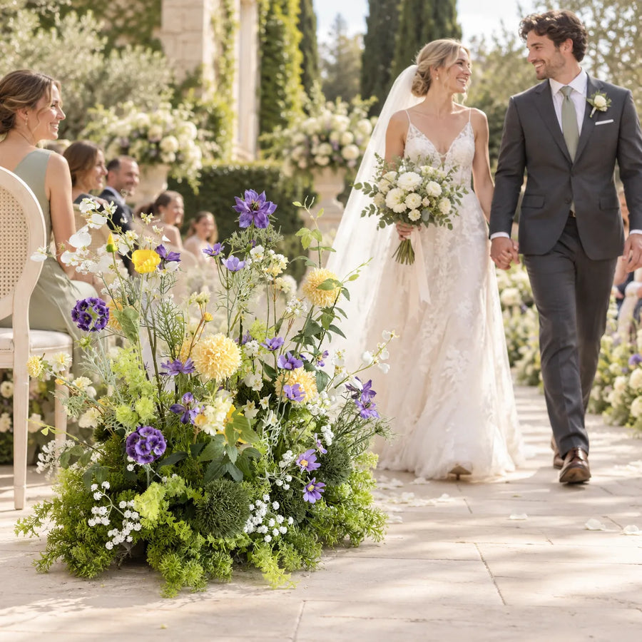 Yellow & Purple Floral Row – Wedding Aisle Decor styled for a wedding celebration